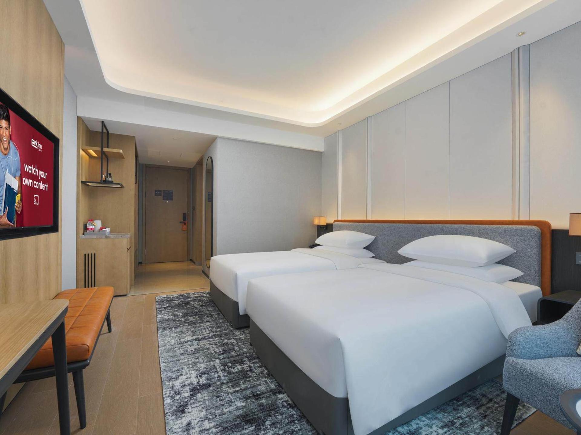 Park Inn By Radisson Nanchong Yilong Star City Plaza Exterior photo